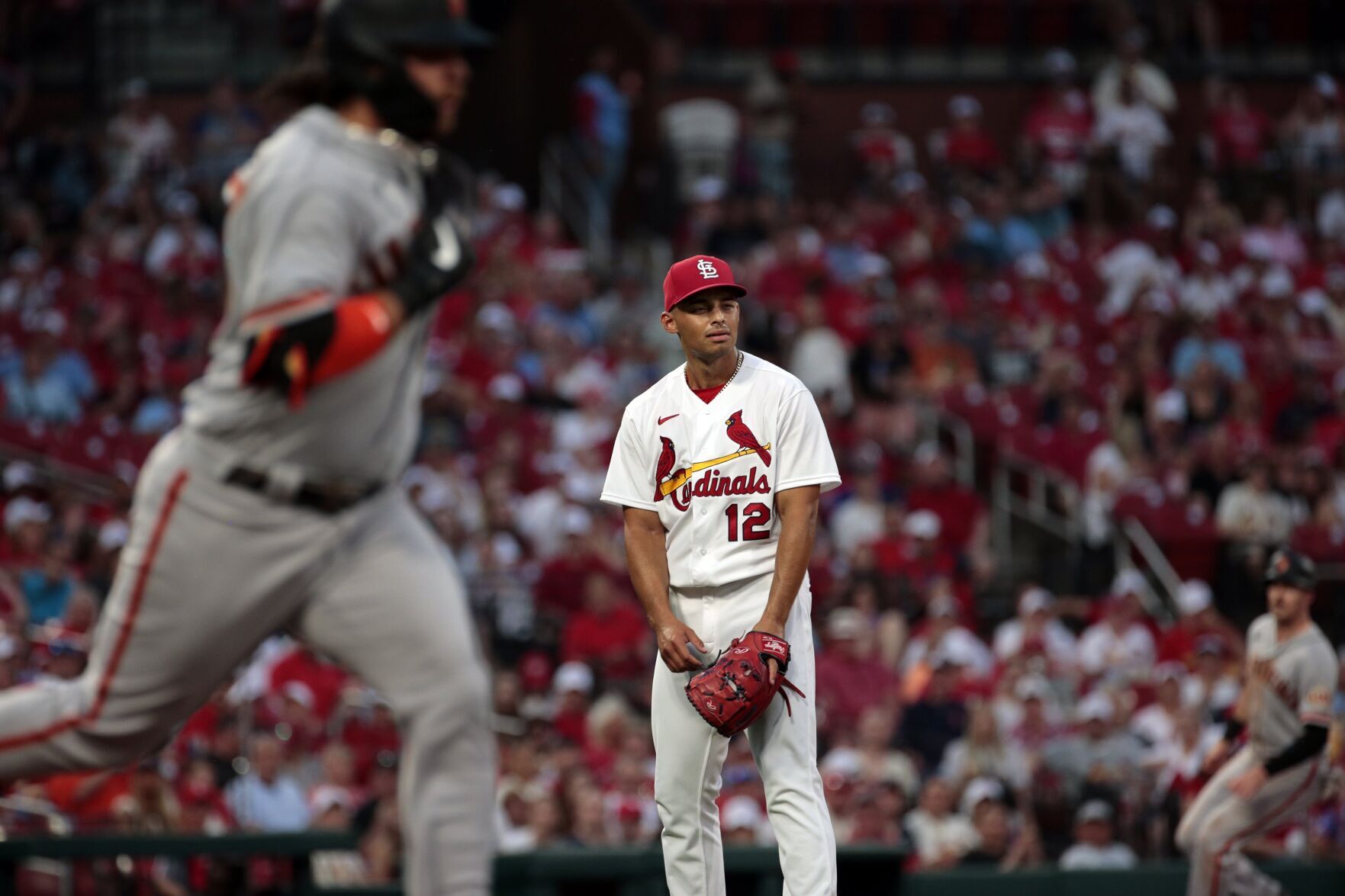 Cardinals open series with Giants